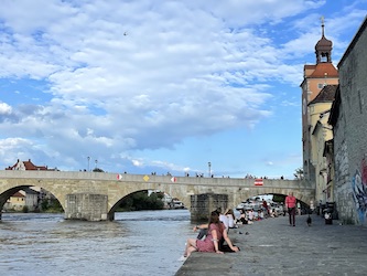 Relaxing in Regensburg at the oldest bridge of Germany from 1135