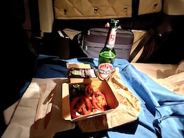 small dinner in my comfy Tesla Dreamcase bed