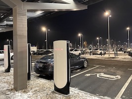 new Tesla Supercharger (V.4) at the Giga and parking lots with hundreds of chargers